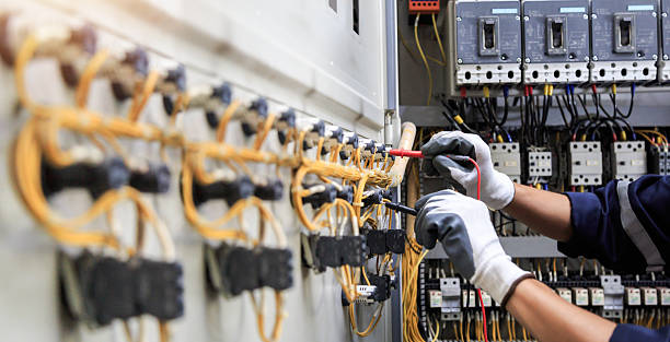Professional Electrician technician working in Hallandale Beach, FL